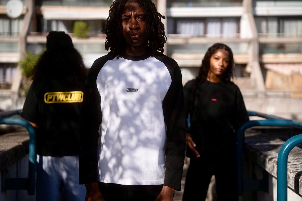 Three models wearing Pave The Wave long-sleeve tops outdoors.